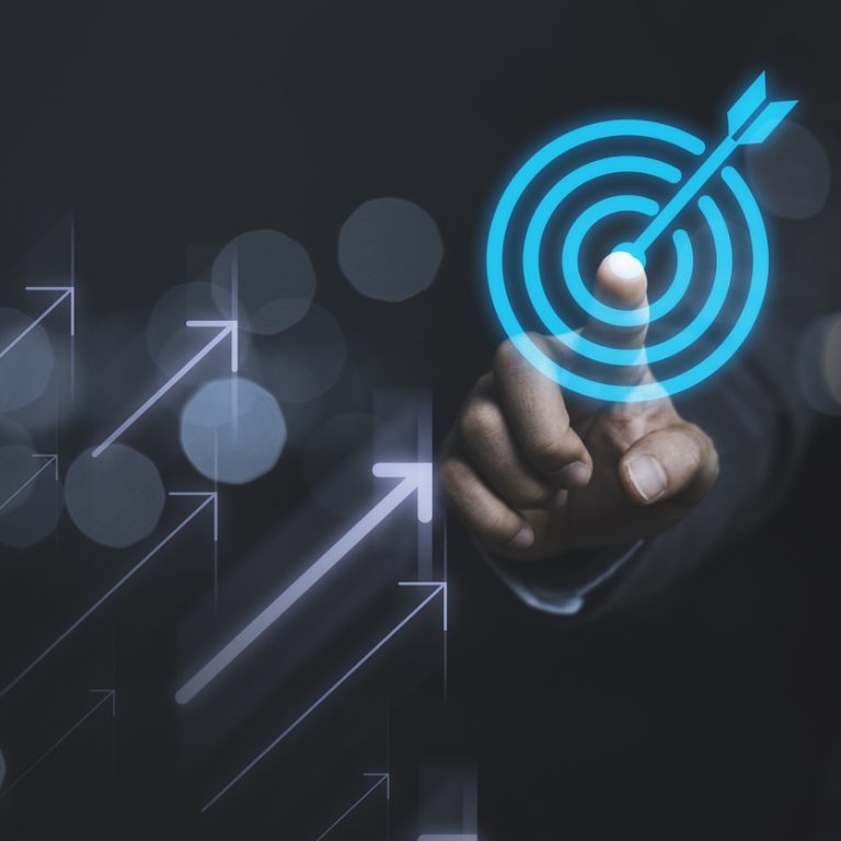 Businessman touching virtual dartboard with arrow ,Business Achievement objective target concept.